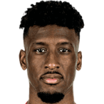 K. Coman